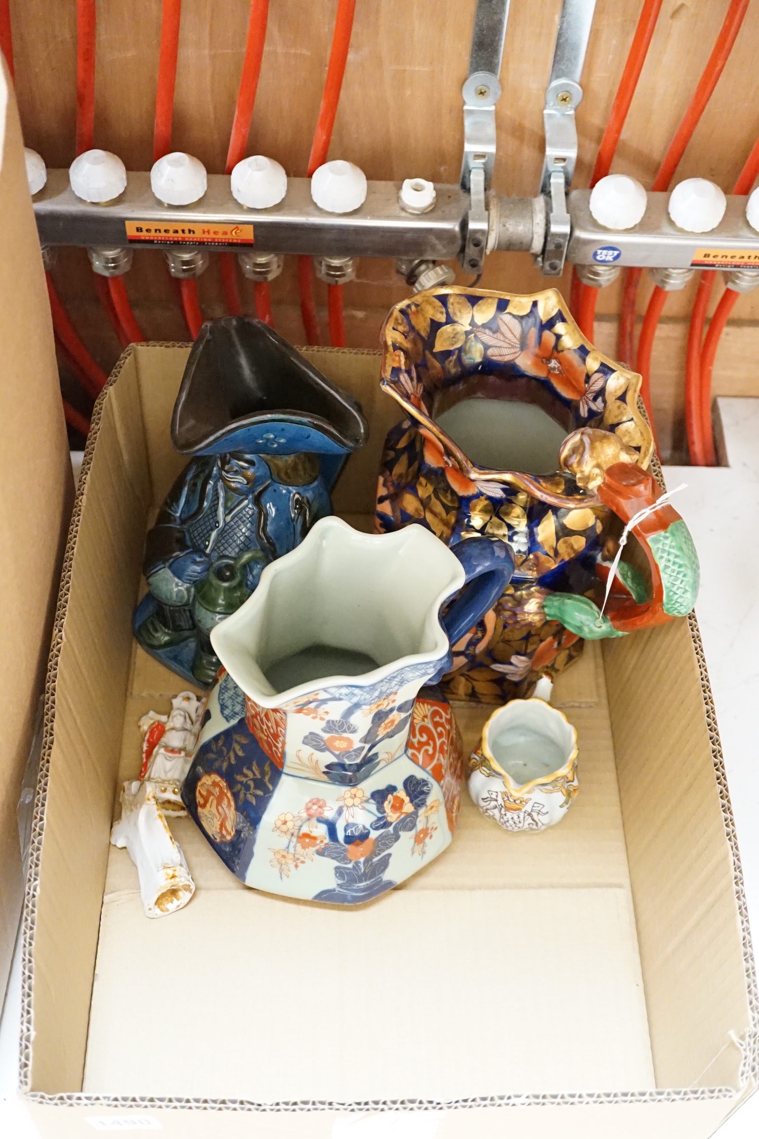 Sundry ceramics including pair of Masons Ironstone jugs, two Toby jugs and faience glazed armorial jug